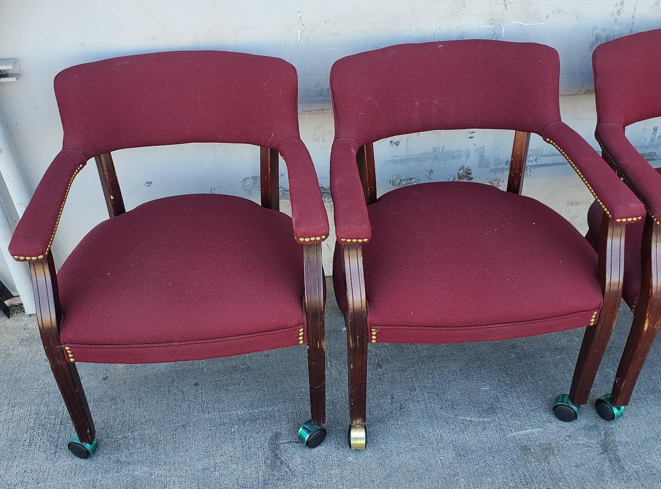 Burgundy Captain guest chairs with casters (4)