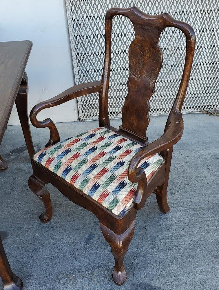 Dark wood dining table with 6 chairs