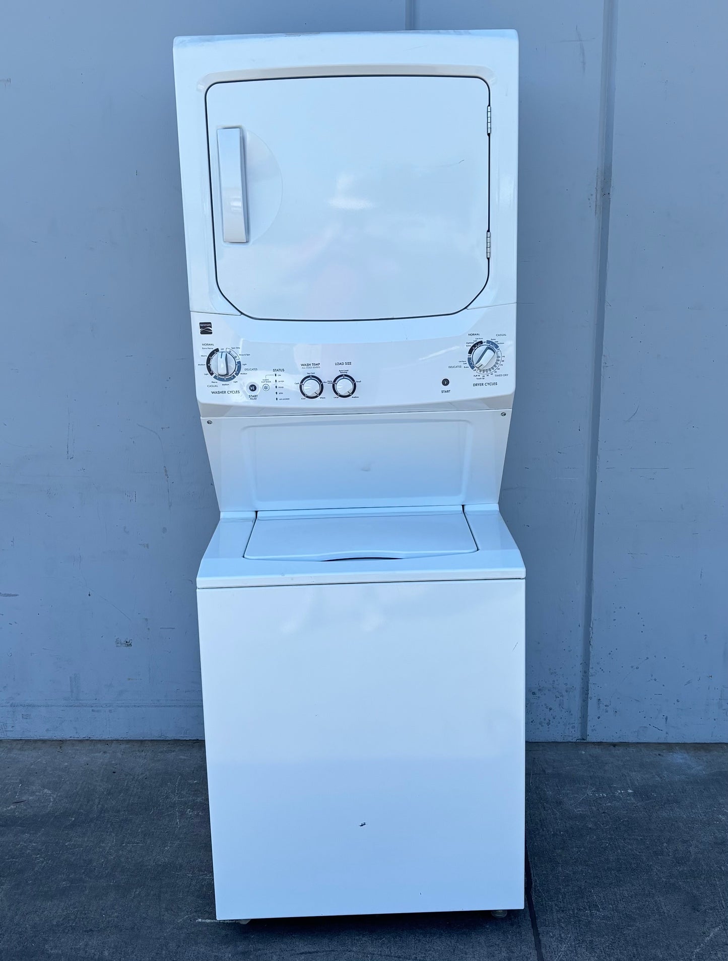 Kenmore white stacked washer and dryer laundry center