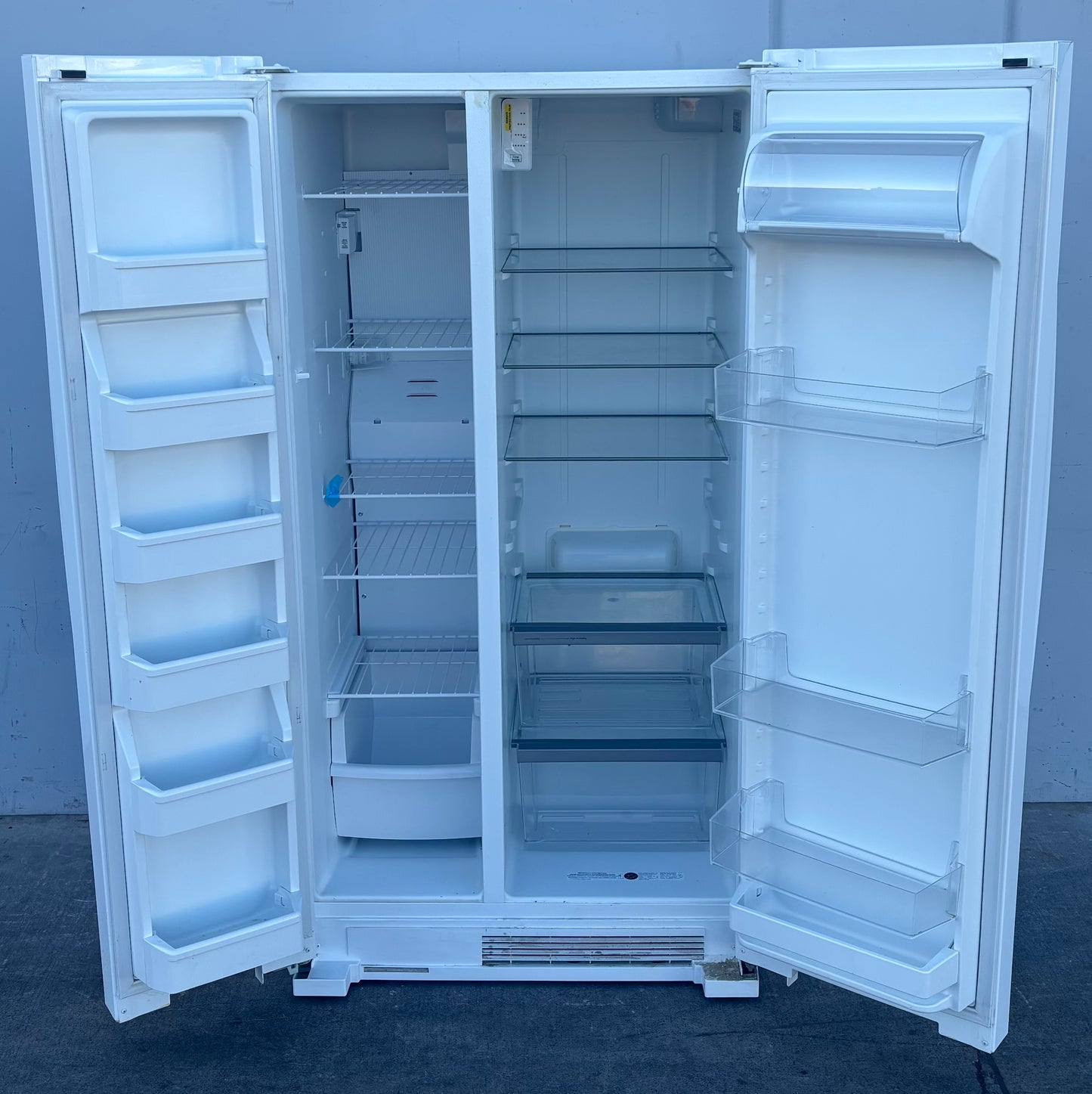 Whirlpool white side by side refrigerator