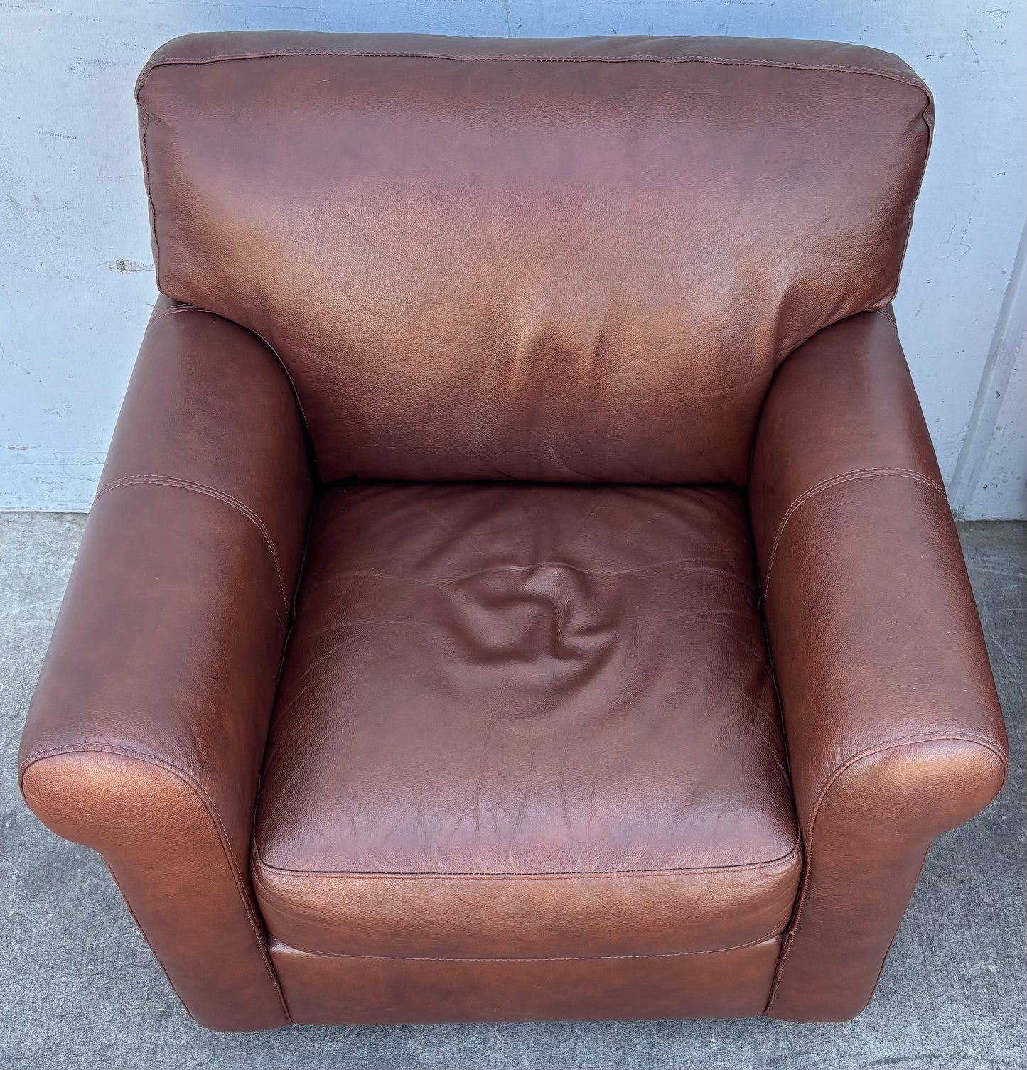 Brown leather armchairs