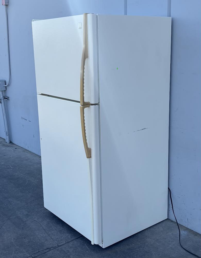 Maytag Plus White refrigerator With Gold Handles