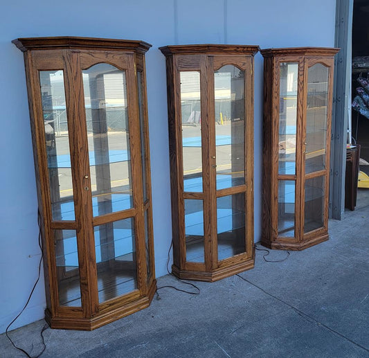 Curio corner display cabinets lighted (2 available/ $200 each)