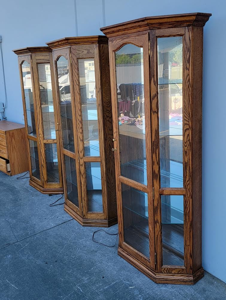 Curio corner display cabinets lighted (2 available/ $200 each)