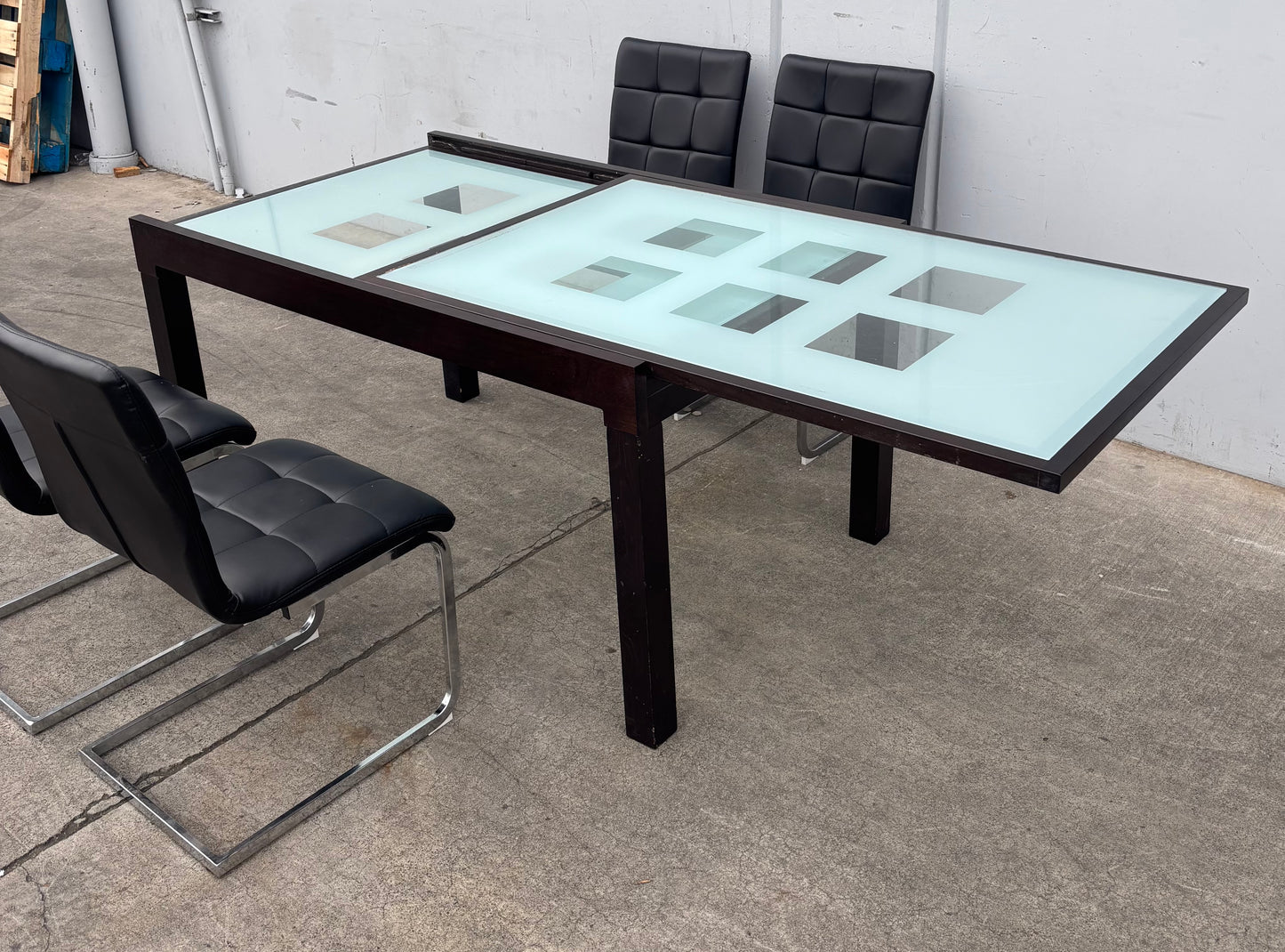 dining set extendable table with frosted glass top and 4 black chairs