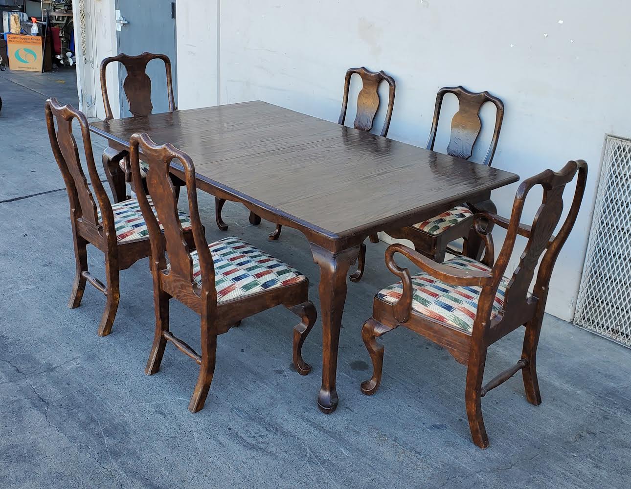 Dark wood dining table with 6 chairs