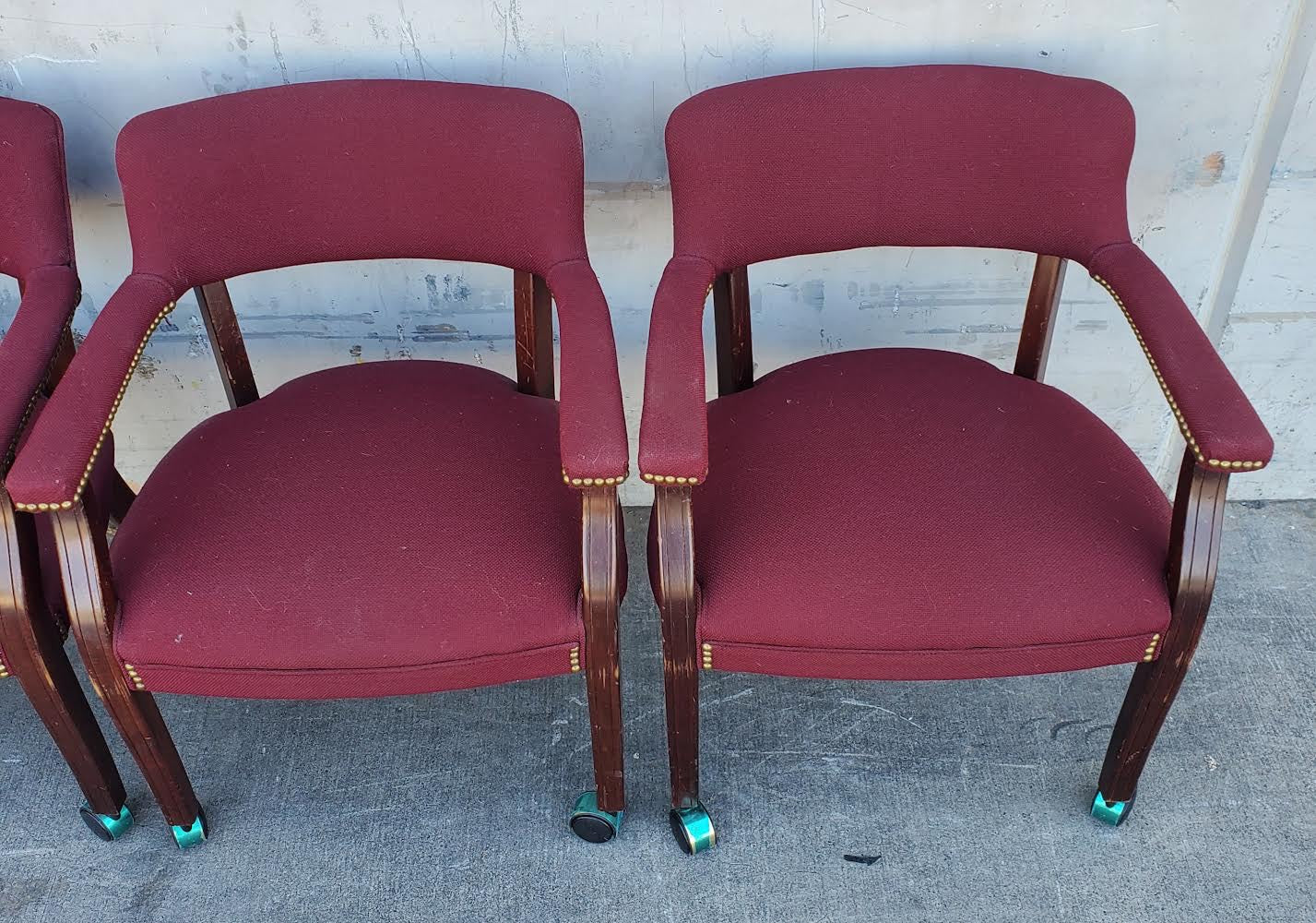 Burgundy Captain guest chairs with casters (4)