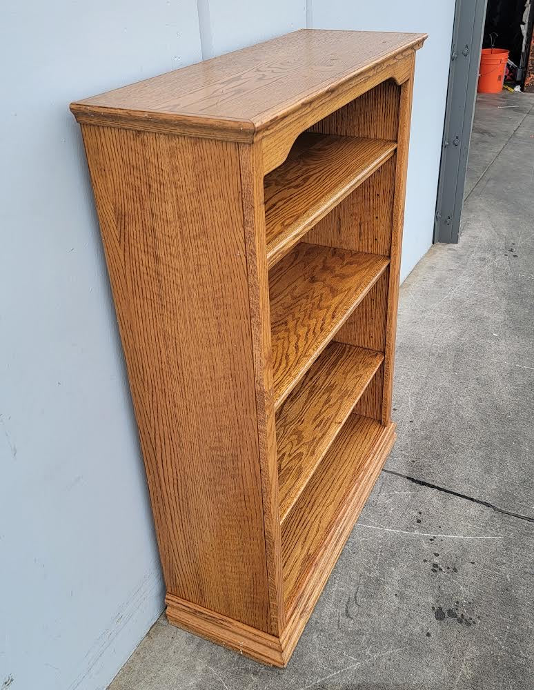 Short 4 shelf light wood bookcase/ bookshelf