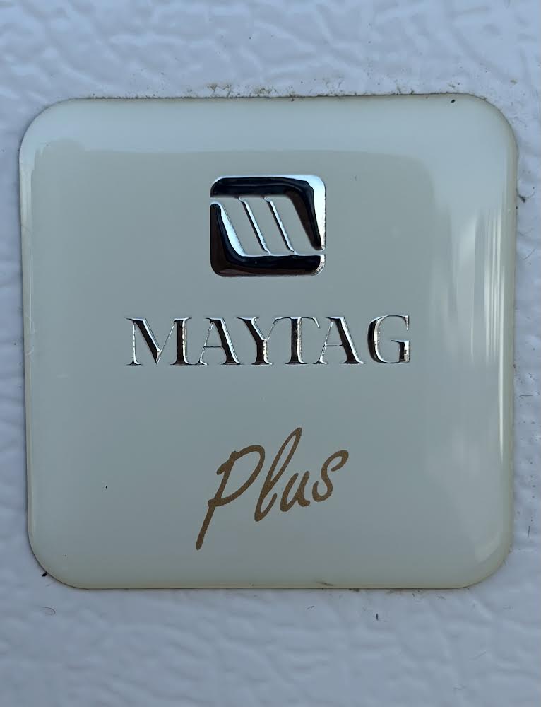 Maytag Plus White refrigerator With Gold Handles