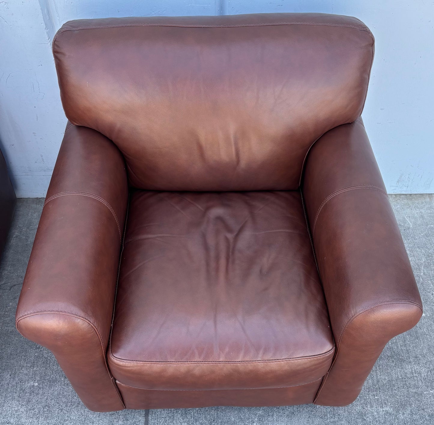 Brown leather armchairs
