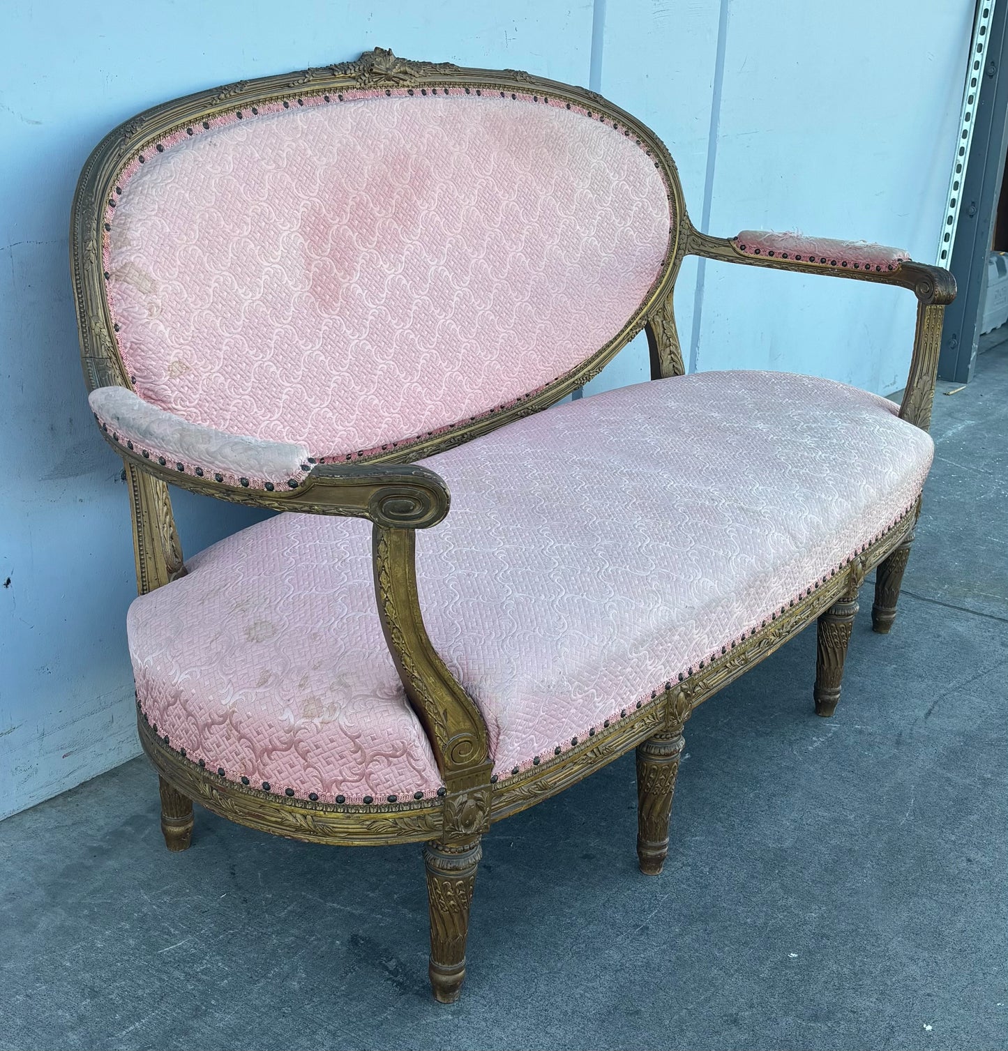 French Louis XVI style pink sofa carved