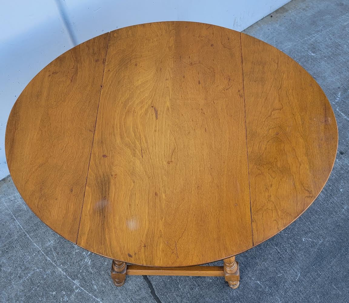 round table with drop leaf sides