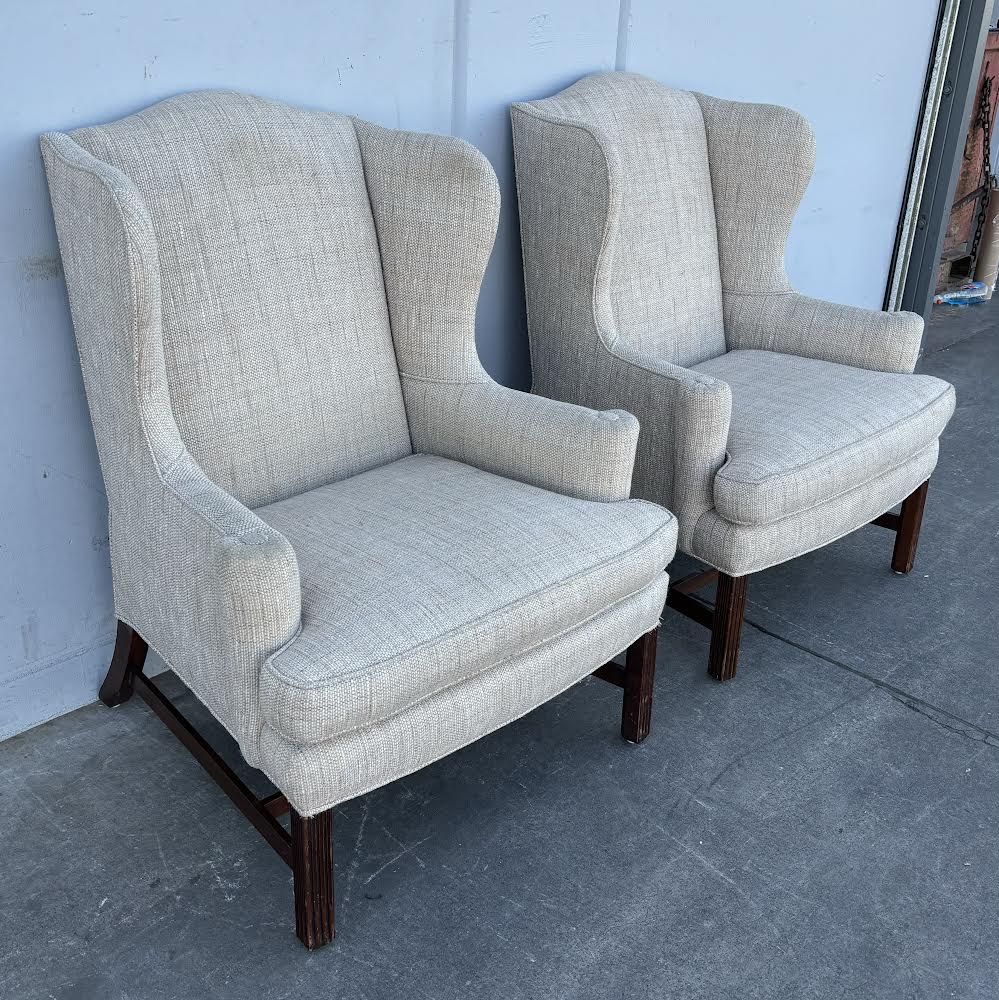 Pair Wing Chairs with High Exposed Wood Leg