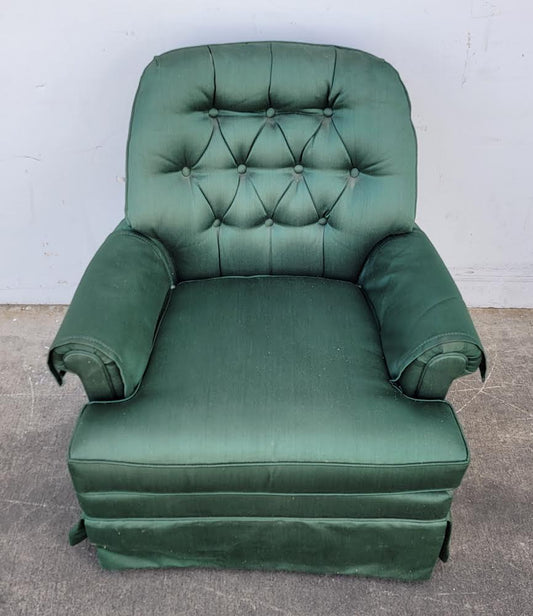 Green rocking armchair