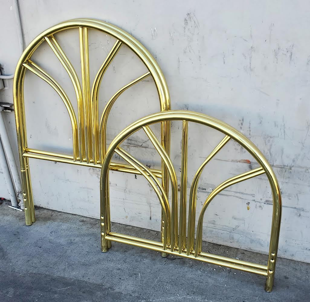 1 Twin size gold/brass headboard and footboard