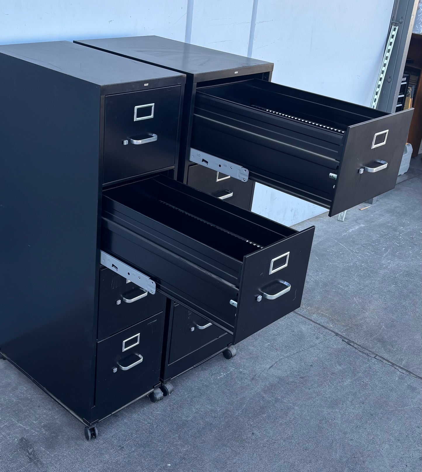 Hon 2 black file cabinets 4 drawer on wheels