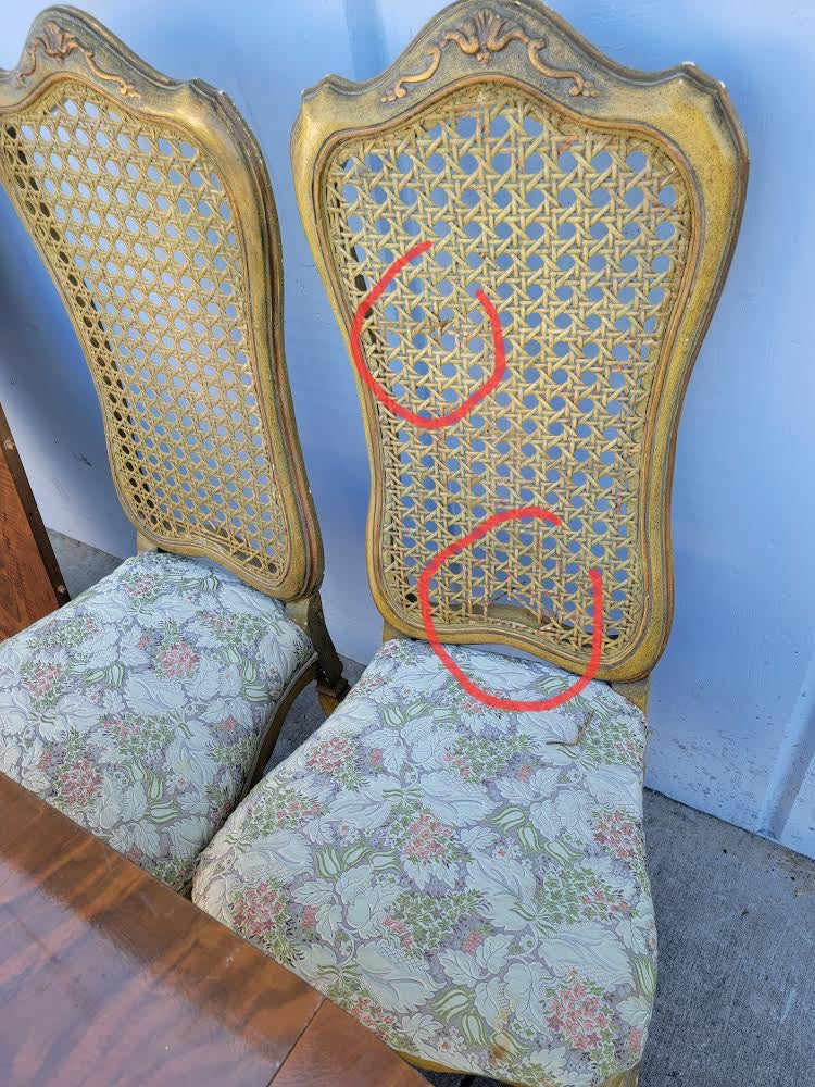 Dining table with 6 wicker high back chairs and leaf
