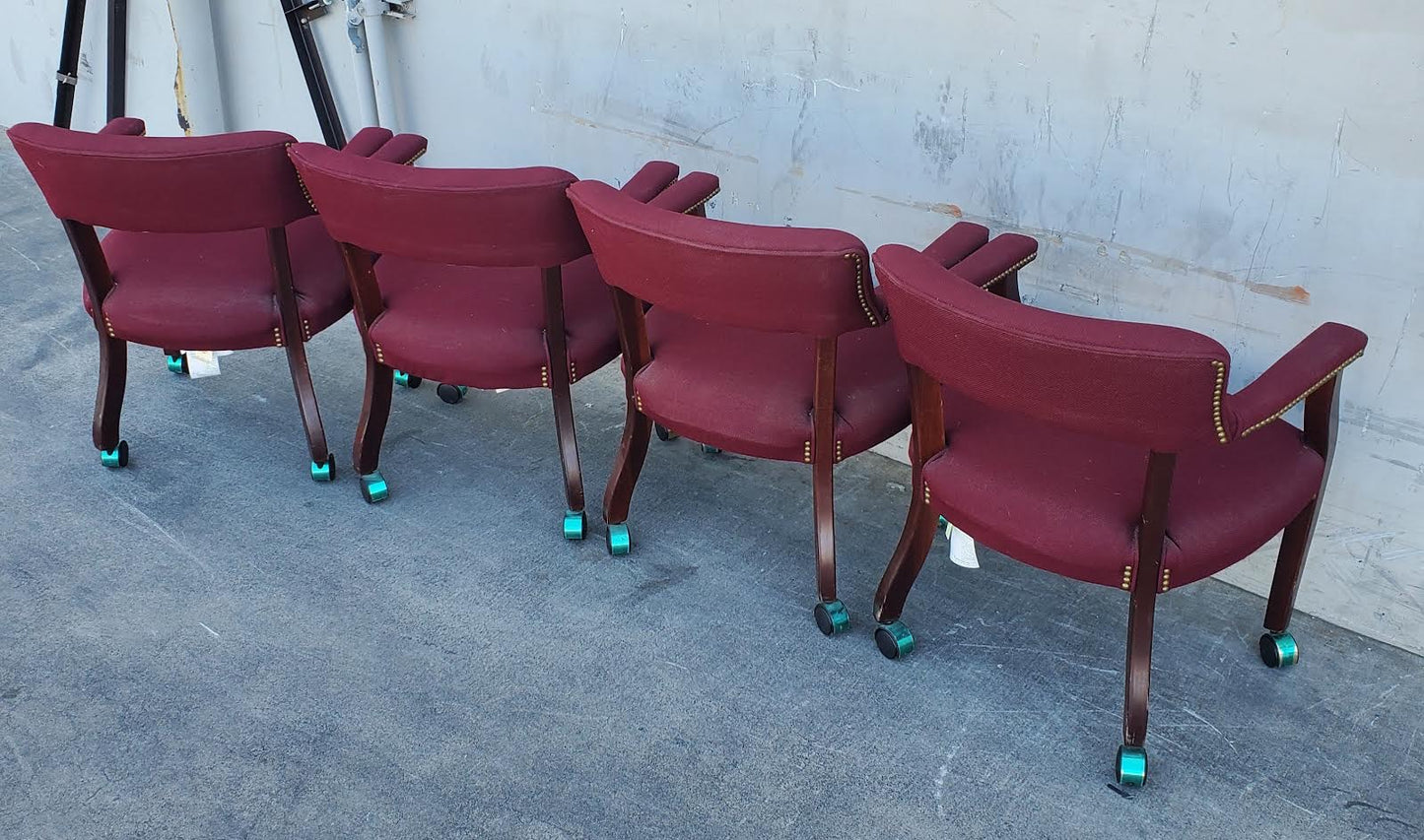 Burgundy Captain guest chairs with casters (4)