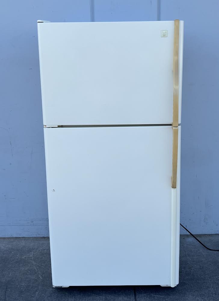 Maytag Plus White refrigerator With Gold Handles