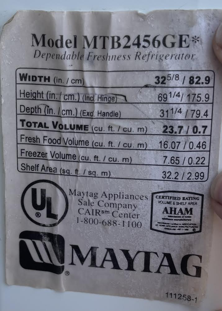 Maytag Plus White refrigerator With Gold Handles
