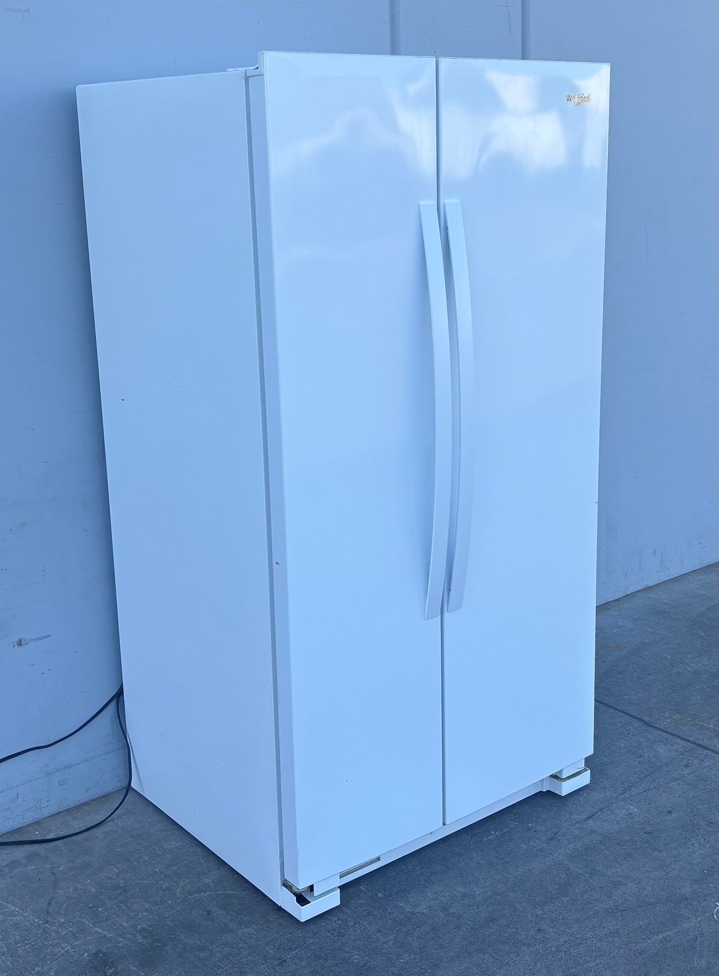 Whirlpool white side by side refrigerator