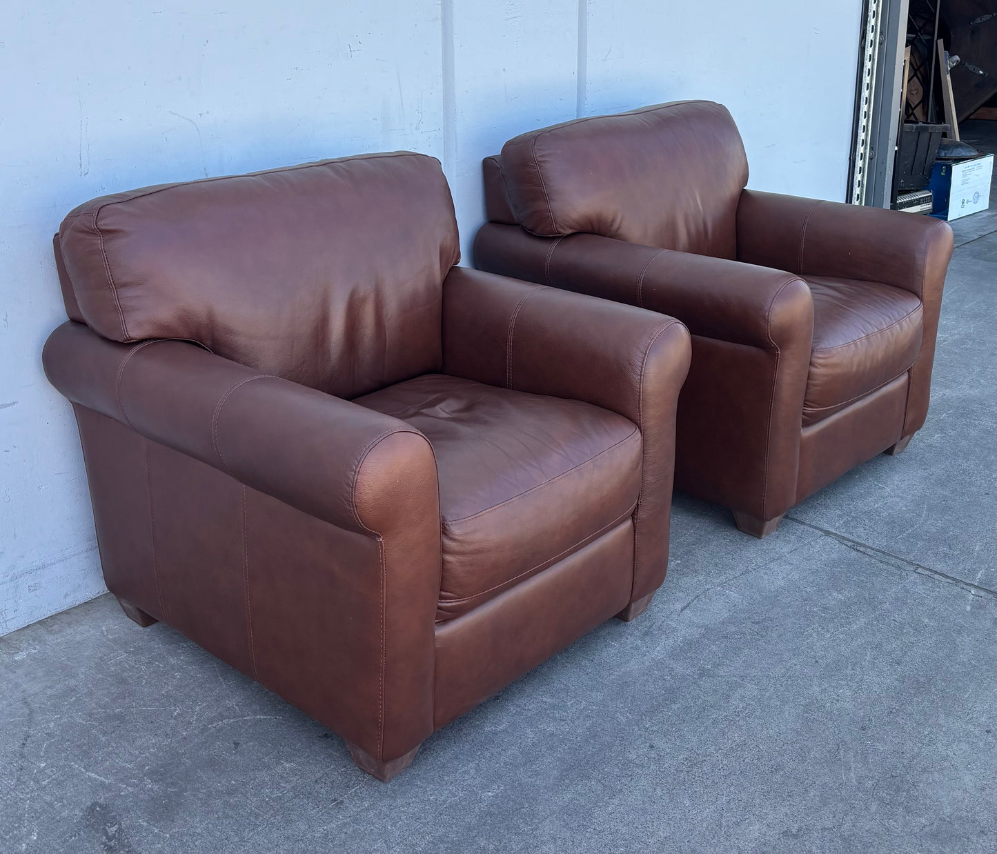 Brown leather armchairs