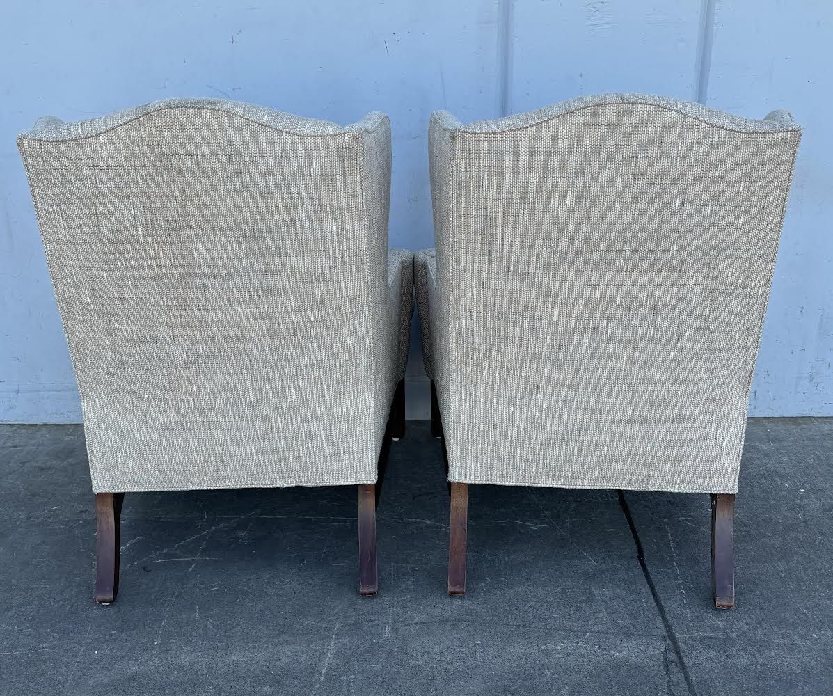 Pair Wing Chairs with High Exposed Wood Leg