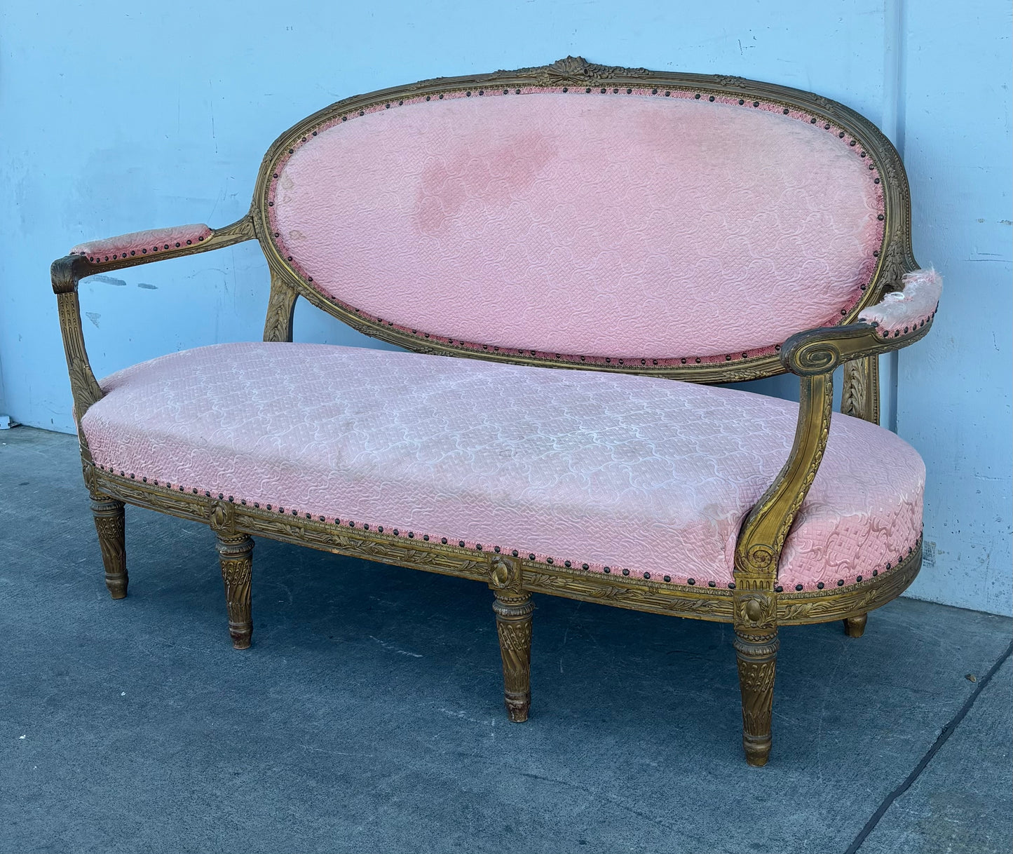 French Louis XVI style pink sofa carved