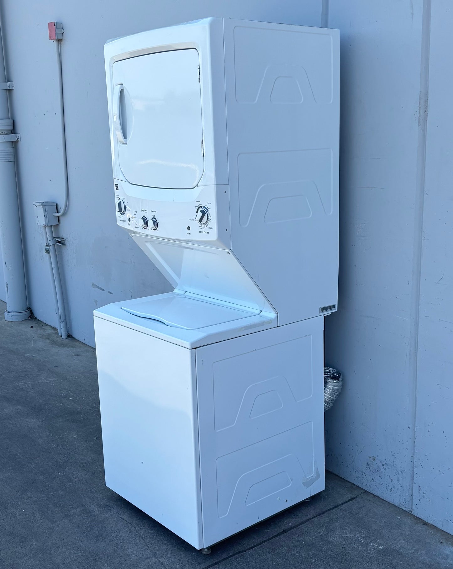 Kenmore white stacked washer and dryer laundry center