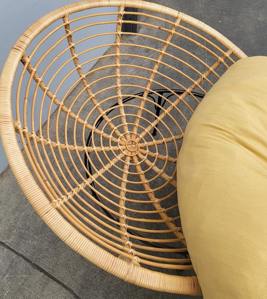 green papasan chair with footstool