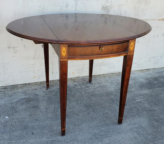 Oval end/side table with drawer drop sides