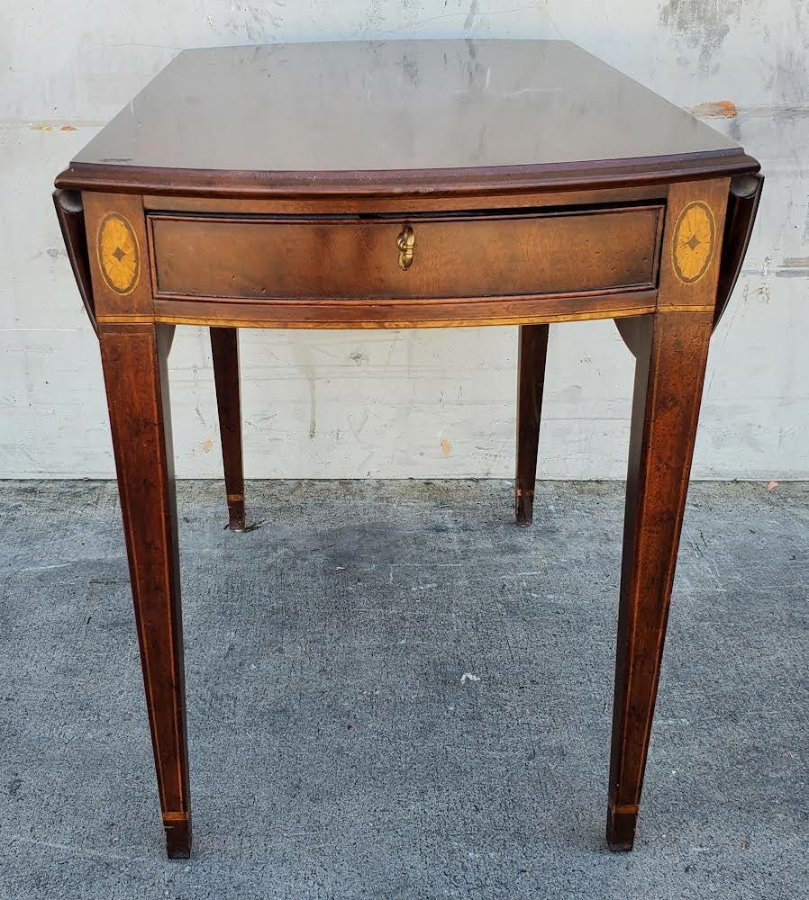Oval end/side table with drawer drop sides