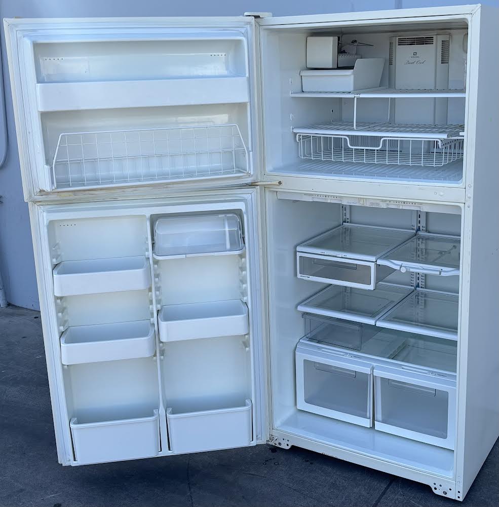 Maytag Plus White refrigerator With Gold Handles