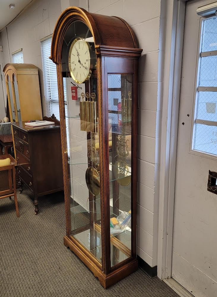 howard miller grandfather clock with curio