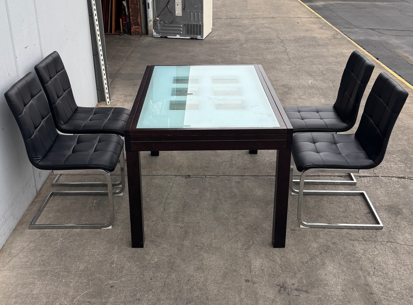 dining set extendable table with frosted glass top and 4 black chairs