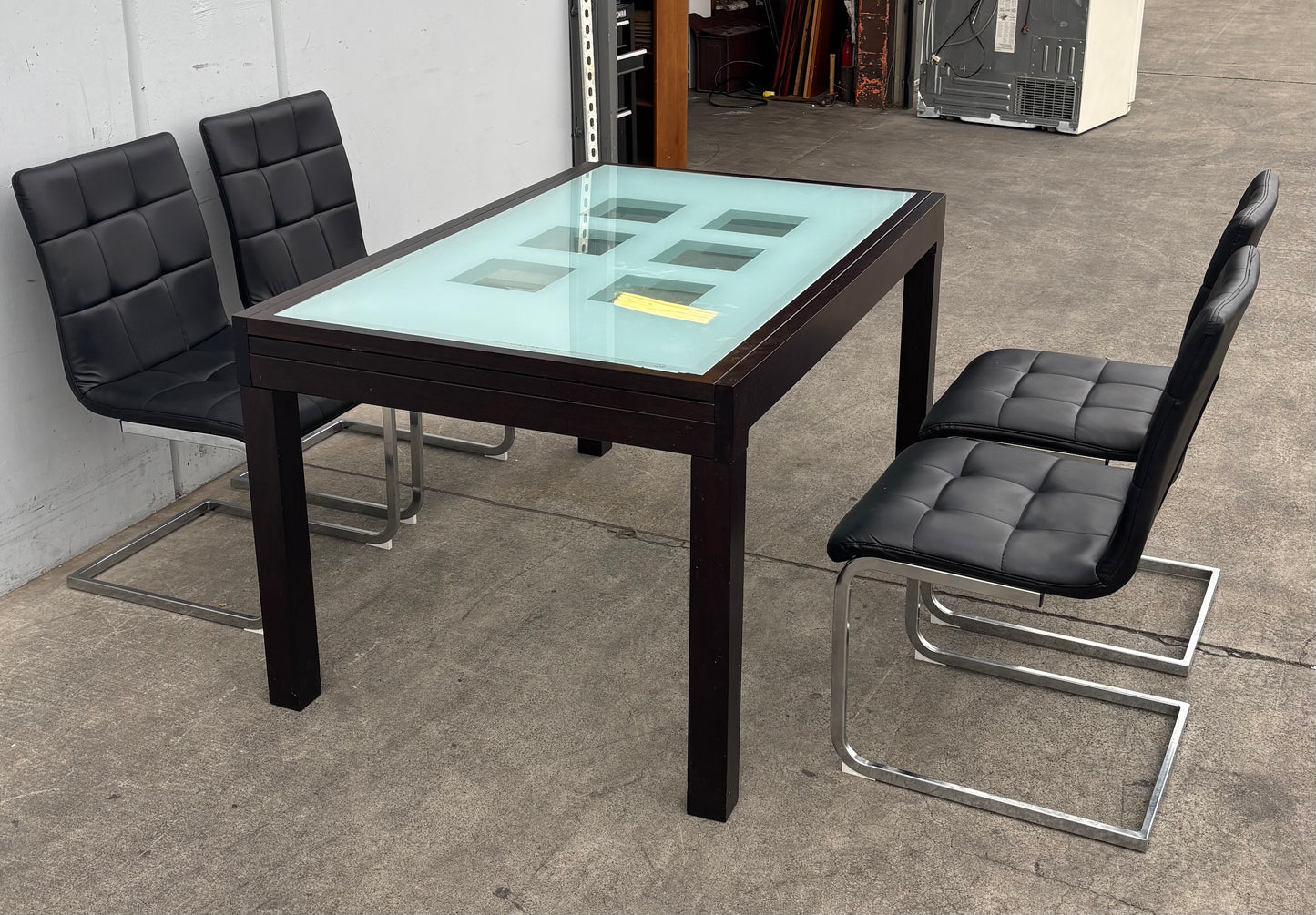 dining set extendable table with frosted glass top and 4 black chairs