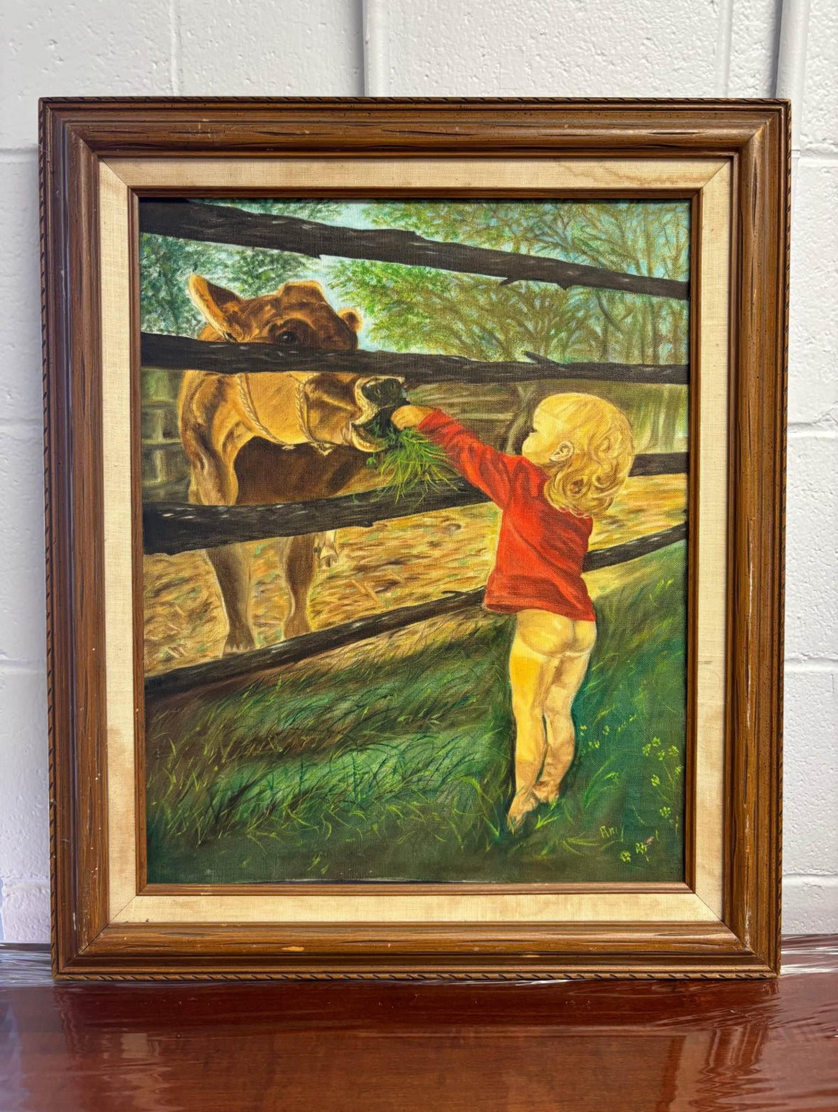 “Little Kid Feeding Cow” oil Framed Painting