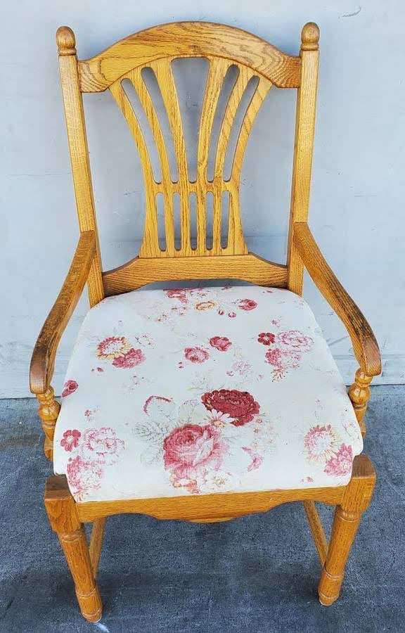 Light wood armchair white floral cushion