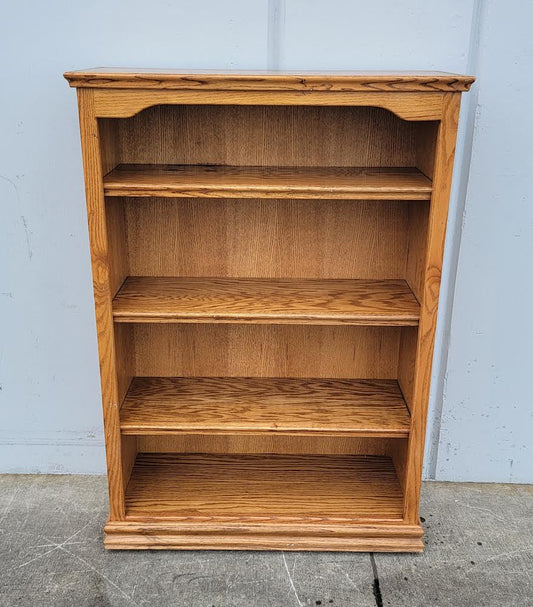 Short 4 shelf light wood bookcase/ bookshelf