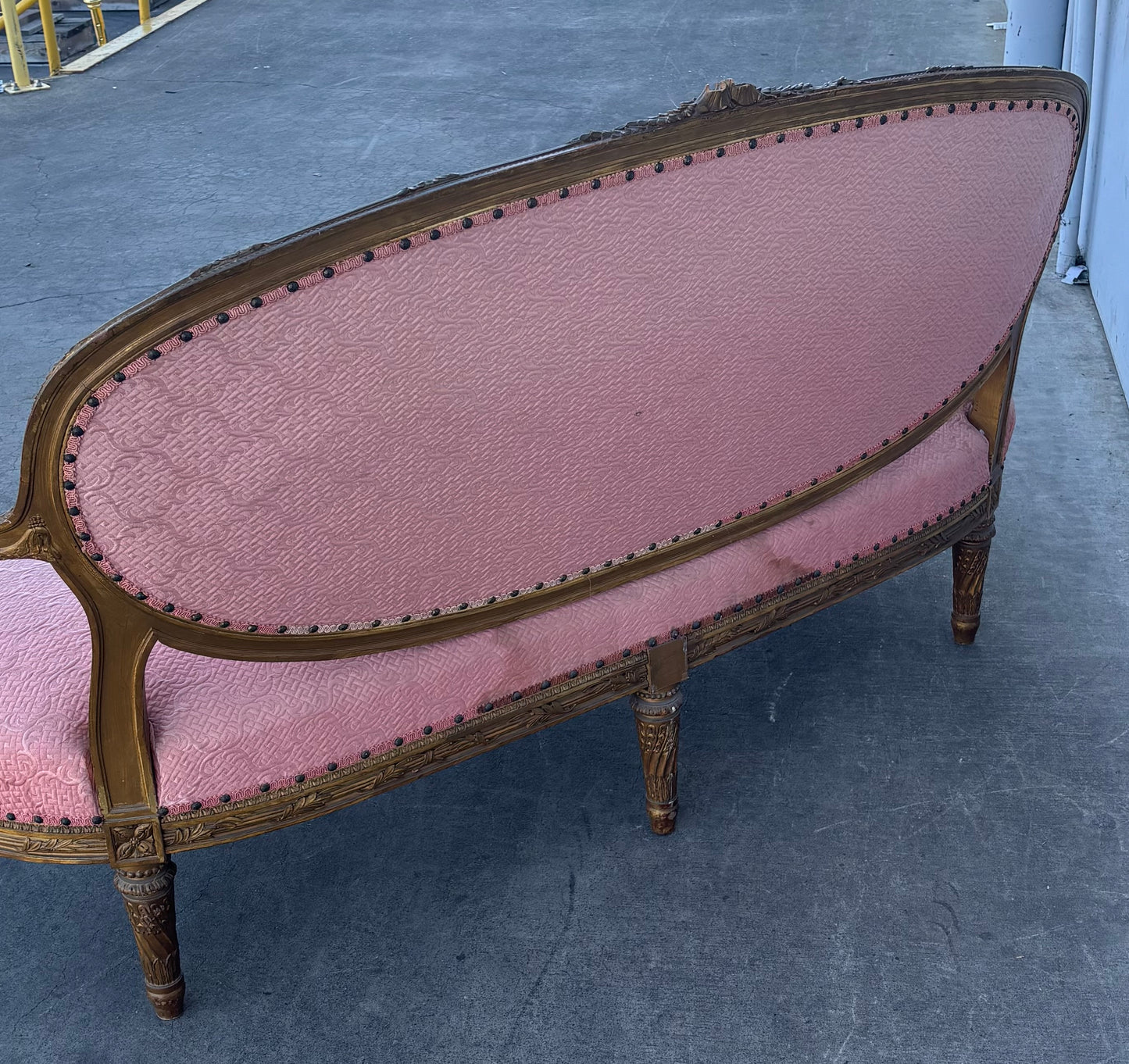 French Louis XVI style pink sofa carved