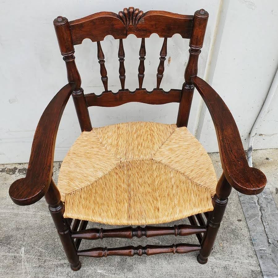 Armchair wicker seat dark wood
