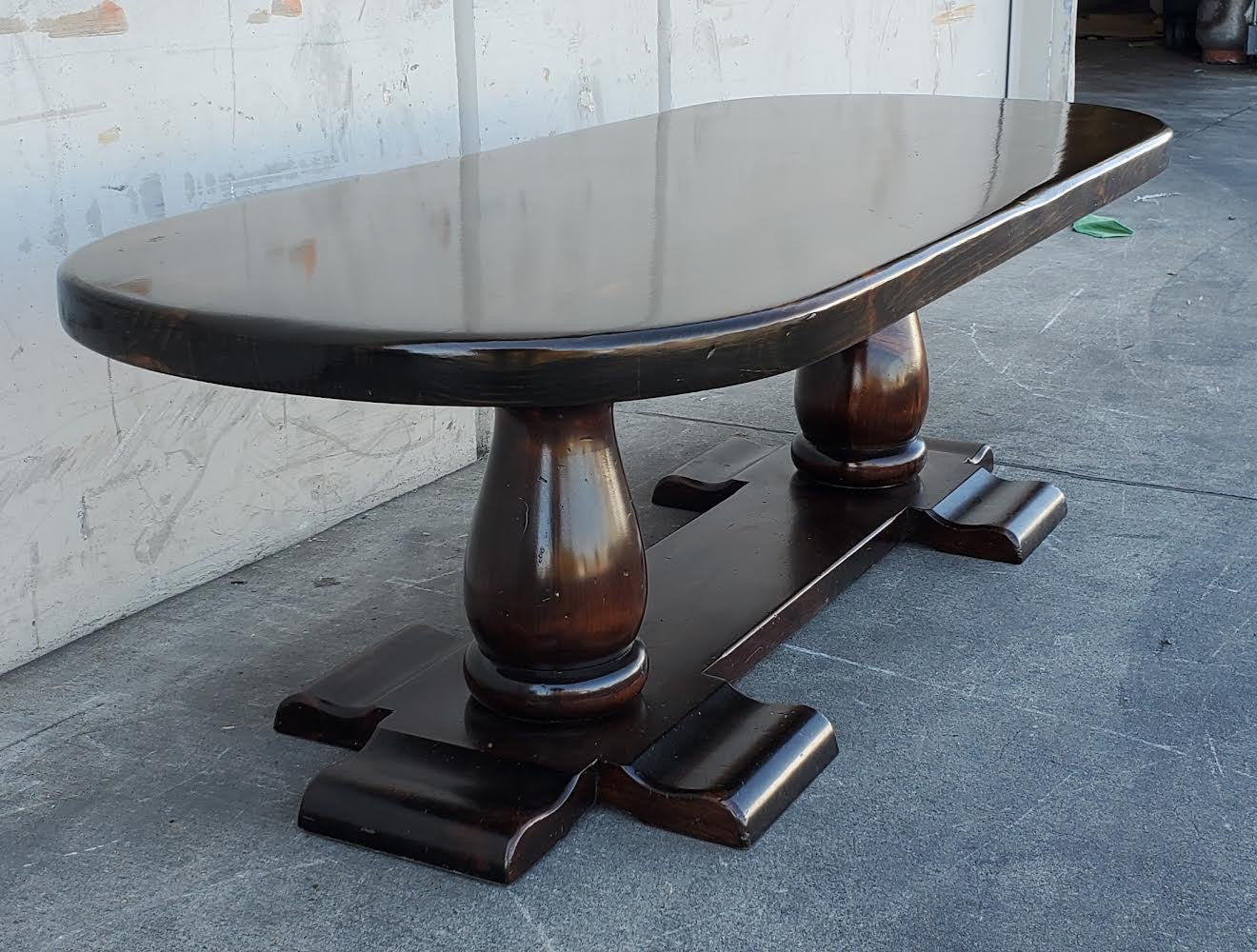 Ethan Allen dark wood round/oval coffee table