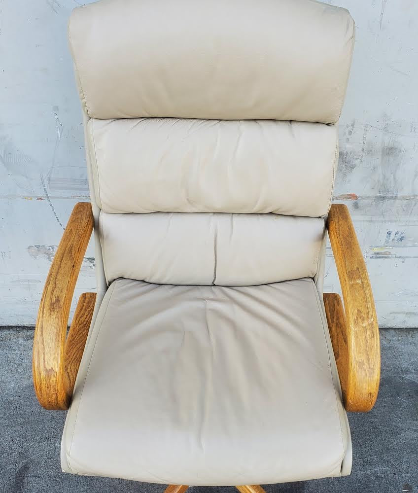 beige/tan office/computer chair on wheels