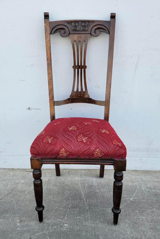 Antique carved chair burgundy cushion