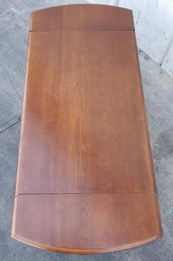 Broyhill coffee table with 2 drawers and side drop down extensions