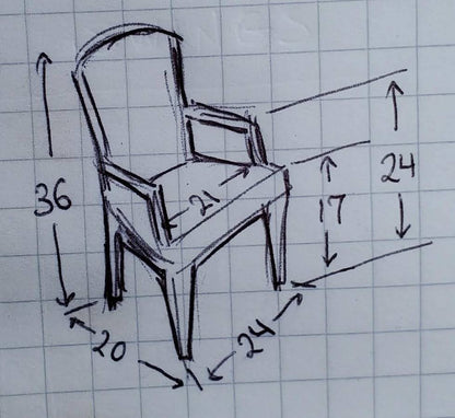 Gilberd’s tan/dark wood armchair