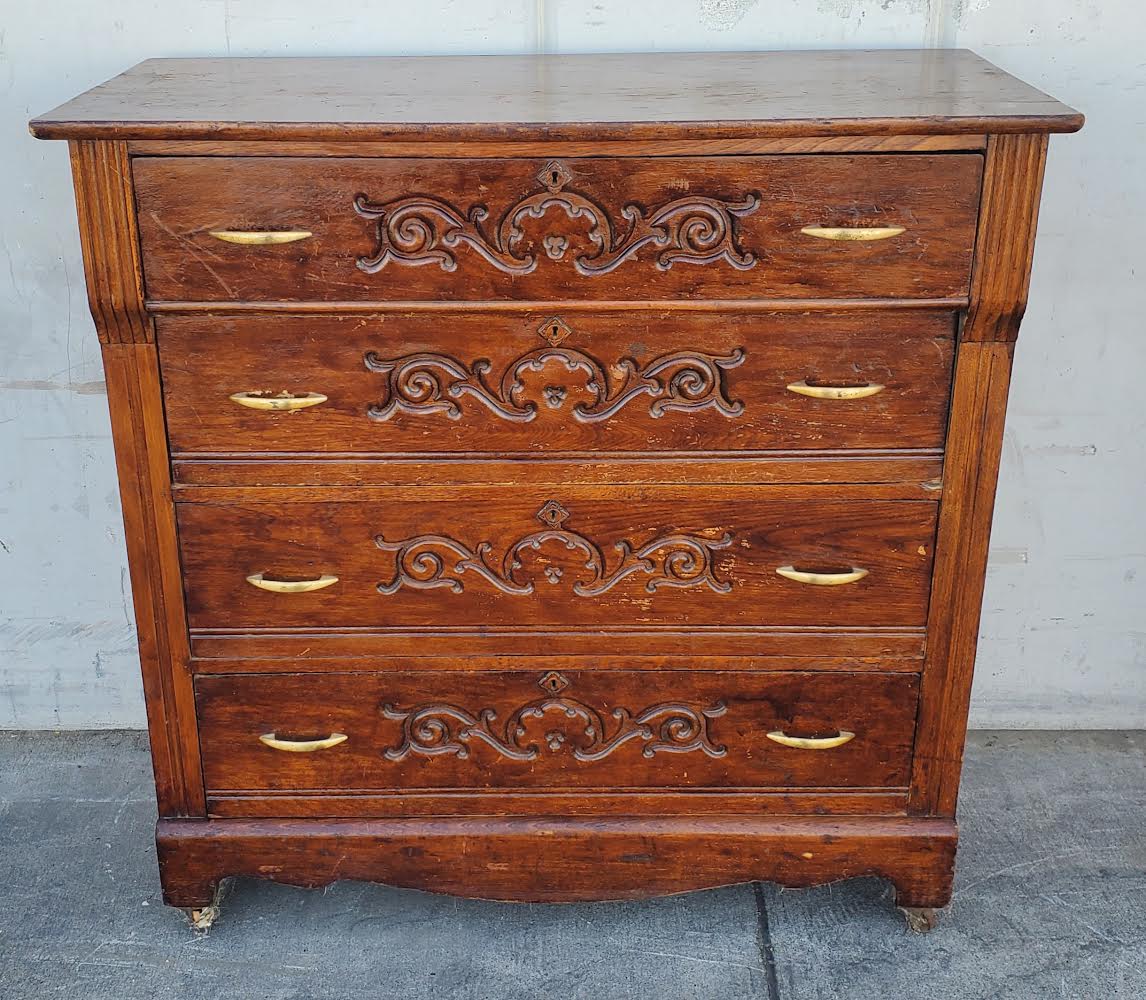antique/vintage dark wood carved dresser /commode/chest of drawers