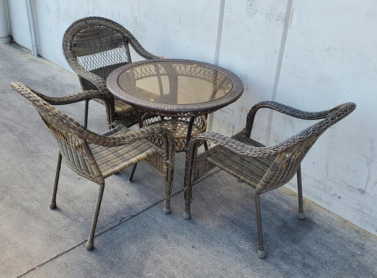 Round patio wicker table and 3 wicker chairs set