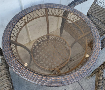Round patio wicker table and 3 wicker chairs set