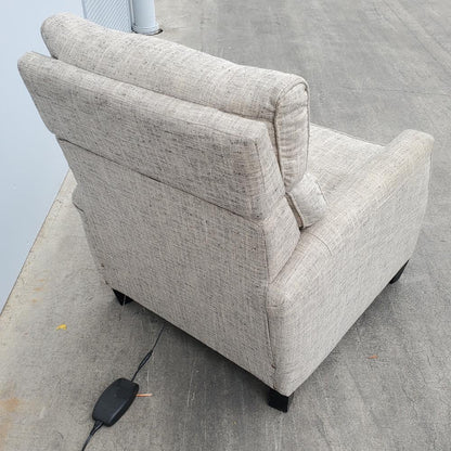 Tan/beige electric recliner armchair